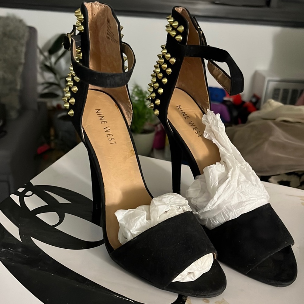 Spiked black heels